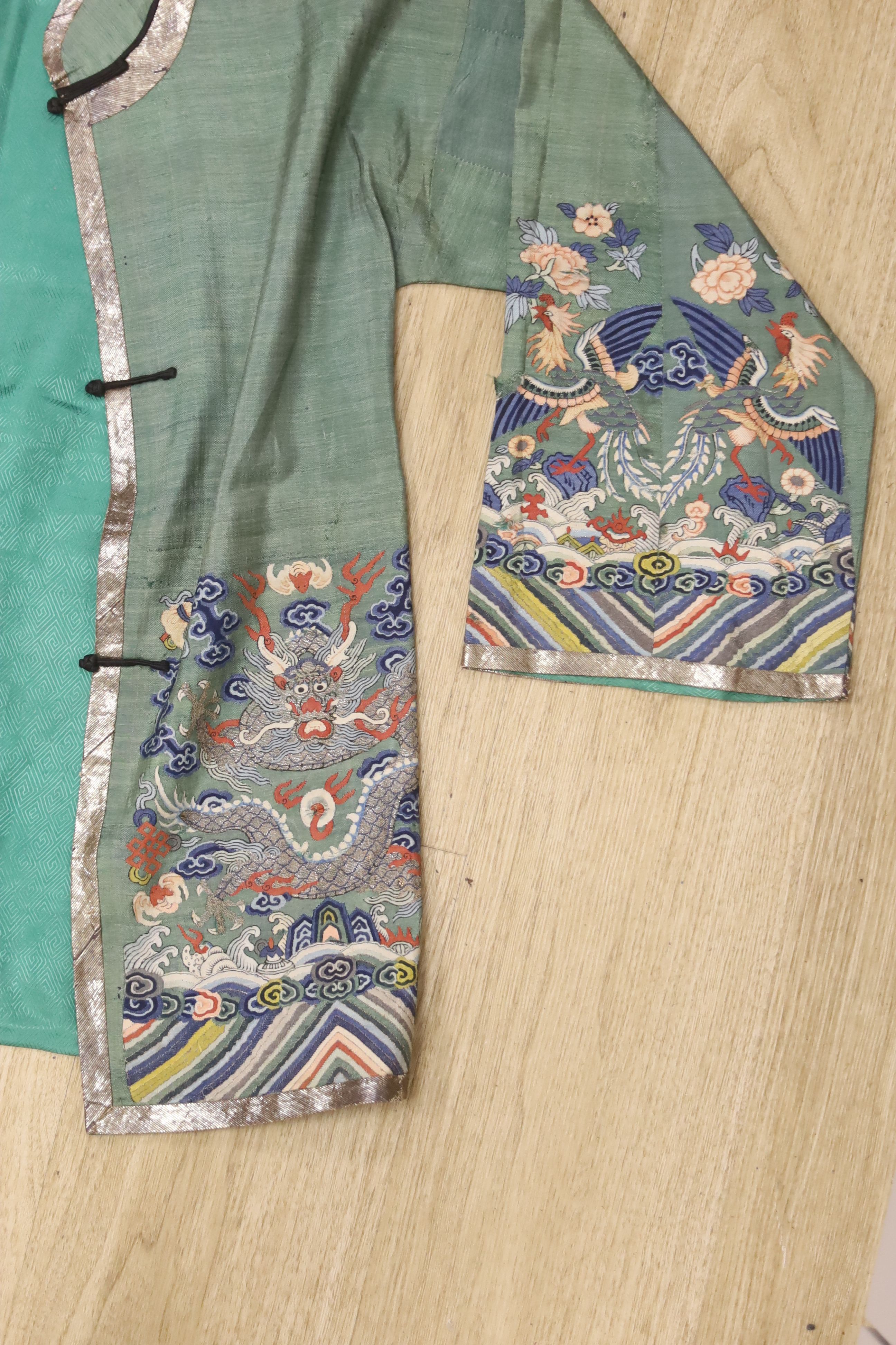 A Chinese Kesi ‘dragon’ jacket, late Qing dynasty, alterations and some wear